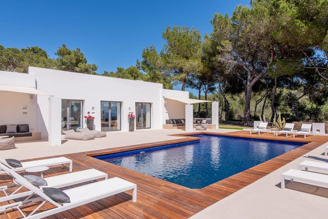 Hilltop designer villa with 360° views and tourist licence, minutes from Ibiza town